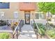 Inviting front entrance with desert landscape and secured front door at 12126 Azure Gate Rd # 1, Las Vegas, NV 89183