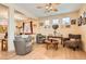 Bright living room with wood floors, neutral walls, and plenty of space for seating at 1252 N Sloan Ln, Las Vegas, NV 89110