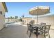Backyard patio with outdoor dining, BBQ grill, and access to the pool at 1252 N Sloan Ln, Las Vegas, NV 89110