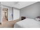 Cozy bedroom with neutral carpet, closet, and connected to the other room in the house at 1547 Harwood Ave, Henderson, NV 89012