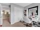Bright bedroom featuring a closet, workspace with a white desk and chair at 1547 Harwood Ave, Henderson, NV 89012