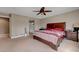 Spacious primary bedroom leading to en suite bathroom at 1547 Harwood Ave, Henderson, NV 89012