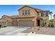 Charming two-story home featuring a well-maintained exterior and a spacious three car driveway at 1547 Harwood Ave, Henderson, NV 89012