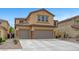 Inviting two-story home with a charming facade and a spacious three car driveway at 1547 Harwood Ave, Henderson, NV 89012