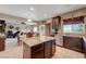 Modern kitchen boasts granite countertops, stainless appliances, and an open layout to the living areas at 1547 Harwood Ave, Henderson, NV 89012