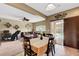 Spacious dining area with access to living room and views of the pool beyond the sliding glass doors at 1547 Harwood Ave, Henderson, NV 89012