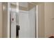 Modern shower with glass door and tile surround at 1547 Harwood Ave, Henderson, NV 89012