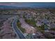 Panoramic aerial view of the neighborhood with city skyline, showcasing rooftops, palm trees, and community layout at 1624 Preston Park Dr, Henderson, NV 89052