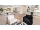Spacious open-concept living area showcasing the kitchen, dining, and Gathering rooms with stylish decor and ample natural light at 1624 Preston Park Dr, Henderson, NV 89052