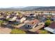 Aerial view showcasing the property's backyard, surrounding neighborhood, and scenic mountain views at 1775 Esteban Ave, Laughlin, NV 89029