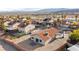 Aerial view showcasing the property's backyard, surrounding neighborhood, and scenic mountain views at 1775 Esteban Ave, Laughlin, NV 89029