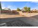 Backyard featuring a stone patio and block wall surrounding the yard at 1775 Esteban Ave, Laughlin, NV 89029