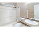 Bathroom featuring a granite countertop, a shower/tub combination with white tiling, and a standard toilet at 1775 Esteban Ave, Laughlin, NV 89029