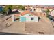 A bright single-story home showcases a terra cotta roof, complemented by a detached carport at 1775 Esteban Ave, Laughlin, NV 89029
