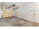 Bright garage with concrete floor, automatic door, and a clean, functional space at 1775 Esteban Ave, Laughlin, NV 89029