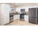 Well-equipped kitchen featuring modern appliances and ample countertop space at 1775 Esteban Ave, Laughlin, NV 89029