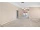 Open concept living room with backyard access and neutral colored walls at 1775 Esteban Ave, Laughlin, NV 89029