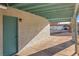 Covered patio extending to the side of the house with outdoor lighting at 1775 Esteban Ave, Laughlin, NV 89029