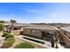 Expansive backyard with a refreshing pool, modern patio, and desert landscaping at 18 Via Tiberina, Henderson, NV 89011