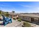 Charming backyard with mountain views, an inviting patio, and well-manicured landscaping at 18 Via Tiberina, Henderson, NV 89011