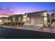 Charming single-Gathering home featuring a modern exterior design, well-manicured landscaping, and a two-car garage at 18 Via Tiberina, Henderson, NV 89011
