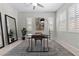 Neutral home office with plantation shutters, modern desk, and stylish decor, perfect for remote work at 18 Via Tiberina, Henderson, NV 89011