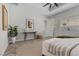 Inviting main bedroom featuring a tray ceiling, contemporary décor, and ample natural light at 18 Via Tiberina, Henderson, NV 89011
