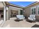 Outdoor patio with comfortable seating area, offering an ideal space for relaxation at 18 Via Tiberina, Henderson, NV 89011