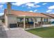 Backyard featuring a covered patio, turf, gravel and room to relax outdoors at 1830 Ginger Blossom Ave, North Las Vegas, NV 89031