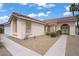 Lovely single-story home featuring a tile roof and a well-maintained desert landscape at 1830 Ginger Blossom Ave, North Las Vegas, NV 89031