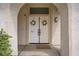 Close-up of the double front doors with decorative wreaths, creating a welcoming entrance at 1830 Ginger Blossom Ave, North Las Vegas, NV 89031