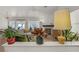 Bright and airy living room featuring stylish furniture, a fireplace, and ample natural light at 1830 Ginger Blossom Ave, North Las Vegas, NV 89031