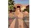 Charming home featuring desert landscaping and a walkway to the front door at 210 Lailani St, Las Vegas, NV 89110