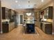 Spacious kitchen featuring an island with granite countertops and stainless steel appliances at 210 Lailani St, Las Vegas, NV 89110