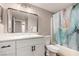 Updated bathroom with sleek vanity, modern fixtures, and stylish shower curtain at 2110 Sleepy Ct, Las Vegas, NV 89106