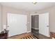 This is a bedroom with a large closet and wood-look flooring at 2110 Sleepy Ct, Las Vegas, NV 89106