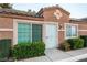 Detailed view of the townhome's entrance with a security door and clean facade at 2110 Sleepy Ct, Las Vegas, NV 89106