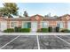 Charming townhome exterior with lush landscaping and a private entrance at 2110 Sleepy Ct, Las Vegas, NV 89106