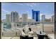 Relaxing condo balcony seating area with a great view of the Las Vegas cityscape at 222 Karen Ave # 1804, Las Vegas, NV 89109