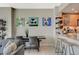 Kitchen area with granite countertops, breakfast bar, and adjacent dining area at 222 Karen Ave # 1804, Las Vegas, NV 89109