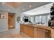 Open floor plan with kitchen area featuring stainless steel appliances and granite countertops, leads to living room at 222 Karen Ave # 1804, Las Vegas, NV 89109