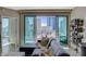 Bright living room featuring modern furnishings and access to the home's balcony at 222 Karen Ave # 1804, Las Vegas, NV 89109