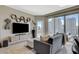 Bright living room with floor-to-ceiling windows offering city views and modern furnishings at 222 Karen Ave # 1804, Las Vegas, NV 89109
