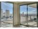 Large windows offer city views in this bright and airy modern home at 222 Karen Ave # 1804, Las Vegas, NV 89109