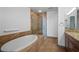 Bathroom with a soaking tub, a glass-enclosed shower, and granite counters at 2260 Village Walk Dr # 1305, Henderson, NV 89052