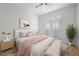 Comfortable bedroom with shutters on a set of french doors that leads to a balcony at 2260 Village Walk Dr # 1305, Henderson, NV 89052