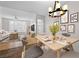 Open-concept dining area that flows into the living room, creating a spacious and airy feel at 2260 Village Walk Dr # 1305, Henderson, NV 89052
