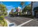 Scenic town square with palm trees, sculptures, and inviting storefronts at 2260 Village Walk Dr # 1305, Henderson, NV 89052