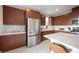 Well-equipped kitchen with stainless steel appliances, generous cabinetry, and stylish backsplash at 2510 Verdello St, Henderson, NV 89044