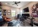 Home office space with natural light, featuring dual desks and displays for a comfortable workspace at 2510 Verdello St, Henderson, NV 89044